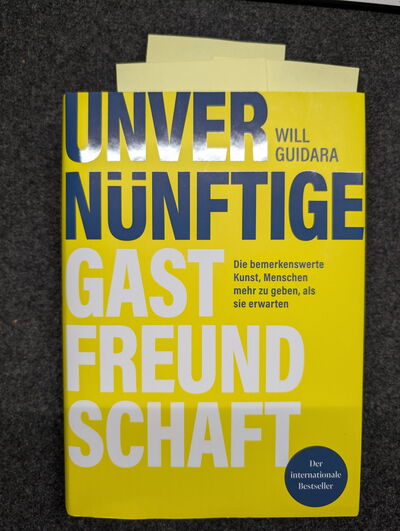 Buchcover von "Unvernünftige Gastfreundschaft" von Will Guidara über außergewöhnlichen Service und echte Großzügigkeit.